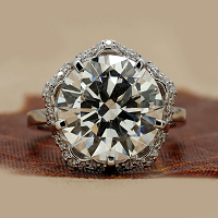 7.28 Ct Round Brilliant Cut Diamond Ring with Vintage-Inspired Scalloped Halo Prong Setting